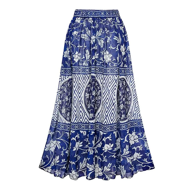 Conjunto de Maiô e Saia Longa “Zaira” com Estampa Floral Tropical em Azul e Branco