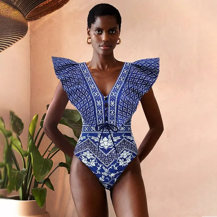 Conjunto de Maiô e Saia Longa “Zaira” com Estampa Floral Tropical em Azul e Branco